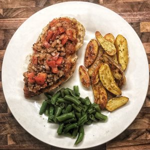 roasted bruschetta chicken with roasted potatoes and green beans